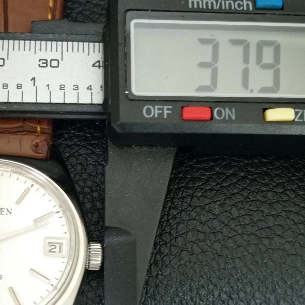 Vintage 1988 Citizen Manual Mens Silver Watch W/date & White accents